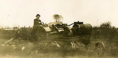 On a an early type of tractor at Kniveton